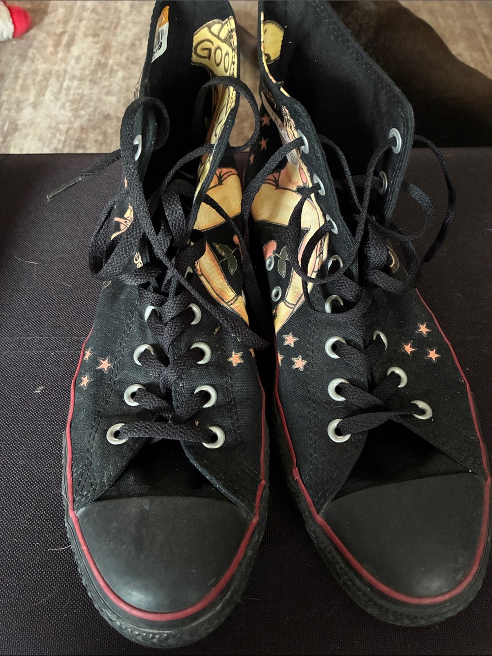 Converse Black High-Top Sneakers with Red Sole Trim and Peach Star Details